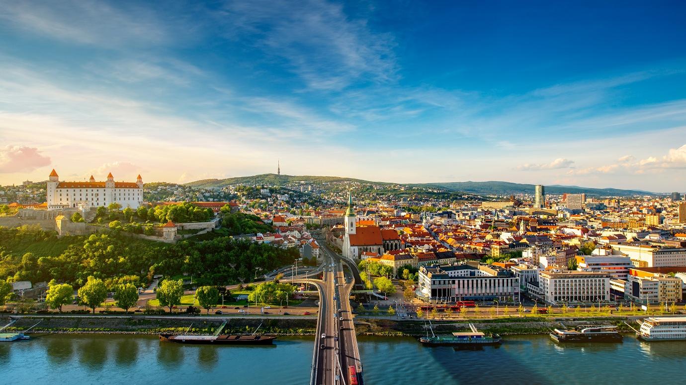 Bratislava aerial cityscape view on the old town with Saint Martin's cathedral, castle hill and Danube river on the sunset in Slovakia.